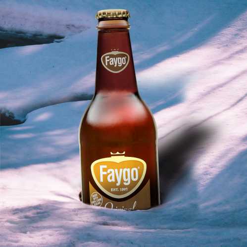 A bottle of Faygo soda partially buried in snow, with a blue background and soft lighting.