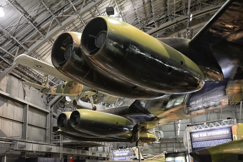 Close-up of aircraft engines in a museum, showcasing military aviation history and engineering.