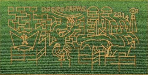 A corn maze design featuring farm animals, buildings, and a farmer, with "Deere Farms 2014" inscribed.
