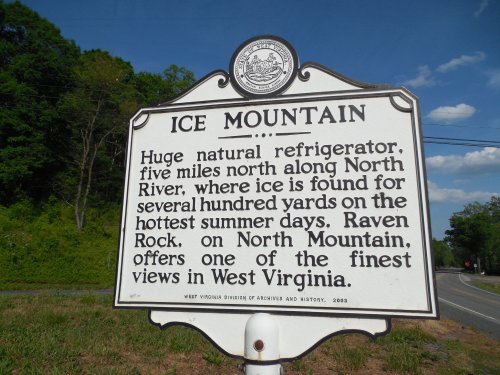 Sign for Ice Mountain, describing it as a natural refrigerator located in West Virginia, known for summer ice.