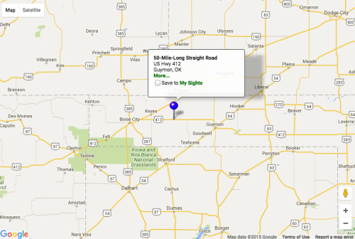 Map showing a section of US Highway 412 near Guymon, Oklahoma, highlighting a 50-mile-long straight road.