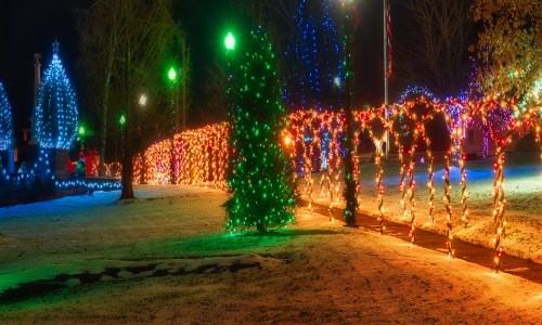 Festive Christmas decorations and lights on the town square.