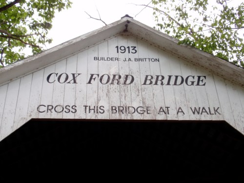 Sign on the Cox Ford Bridge, built in 1913, instructing to cross at a walk.