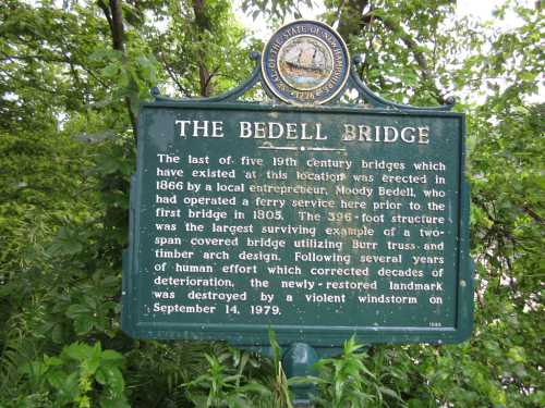 Historical marker for the Bedell Bridge, detailing its history and restoration after being destroyed in 1979.