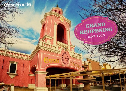Colorful building with "Casa Bonita" sign, announcing "Grand Reopening May 2023" against a blue sky.