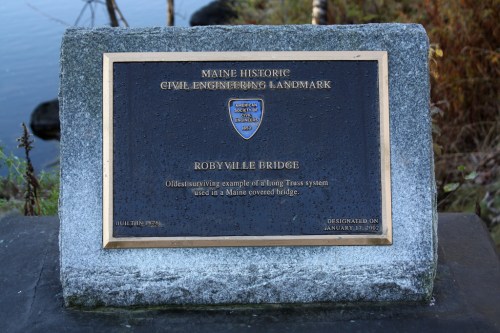 Plaque marking Roby Ville Bridge as a Maine Historic Civil Engineering Landmark, detailing its significance.