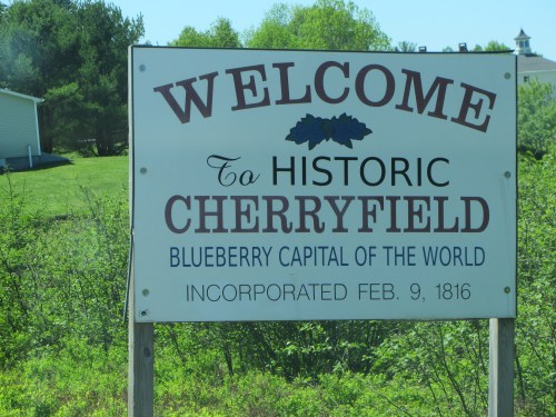 Sign welcoming visitors to Cherryfield, the "Blueberry Capital of the World," established in 1816.