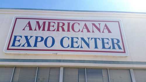 Sign for "Americana Expo Center" displayed prominently on a building exterior.