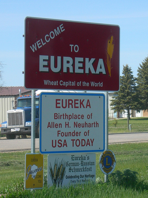 Welcome sign for Eureka, Wheat Capital of the World, noting birthplace of USA Today founder Allen H. Neuharth.