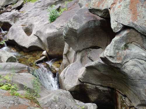 Sculptured Rocks Natural Area In NH Is An Emerald Canyon