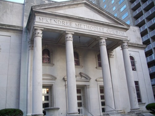 Front view of McKendree Methodist Church, featuring tall columns and a classic architectural design.