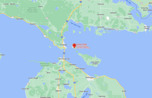 Map showing the location of Grand Hotel near Mackinaw City, Michigan, with nearby landmarks and water bodies.