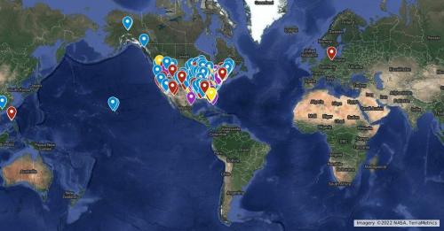 A world map with various colored markers indicating specific locations across North America, Europe, and Asia.