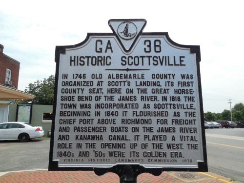 Historic marker for Scottsville, VA, detailing its founding and significance in the 18th and 19th centuries.