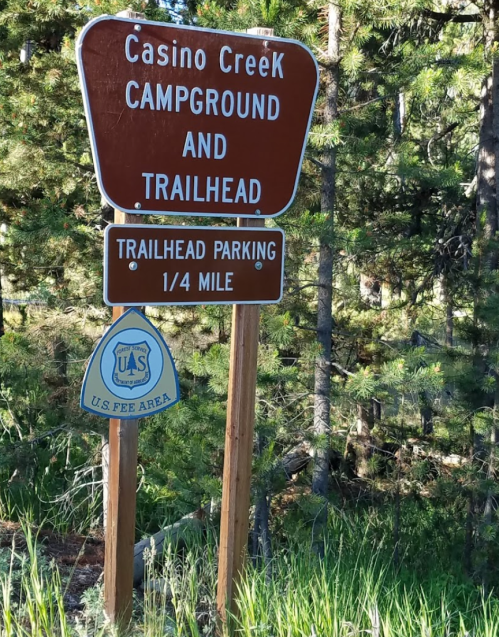 Sign for Casino Creek Campground and Trailhead, indicating trailhead parking is 1/4 mile ahead. U.S. fee area.