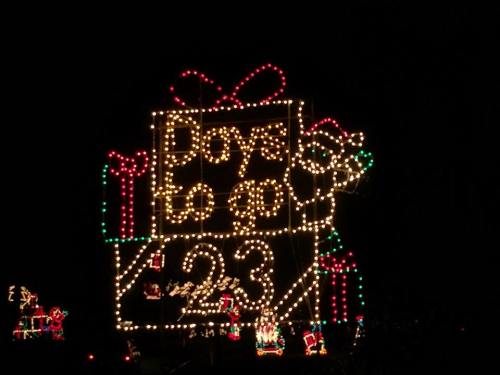 A festive display of lights showing "23 Days to go" with gifts and a Santa figure.