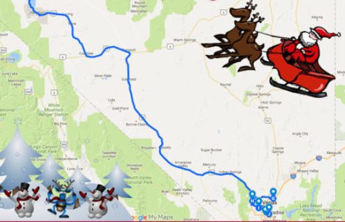 A festive map showing Santa on a sleigh with reindeer, surrounded by Christmas trees and snowmen.