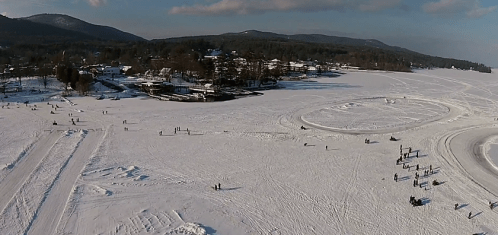 Screenshot of a YouTube page featuring a video about the Lake George NY Winter Carnival 2015, with snowy landscape.