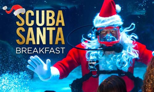 A Santa in a scuba suit underwater, with festive decorations, promoting a "Scuba Santa Breakfast" event.