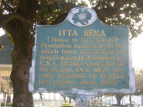 Historical marker for Itta Bena, Mississippi, detailing its plantation home site and notable historical events.