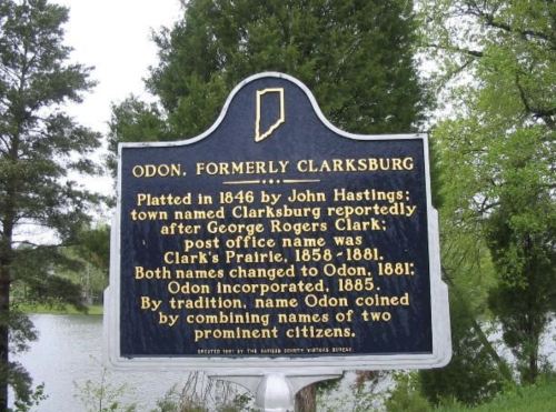 Historical marker for Odon, Indiana, detailing its founding, name changes, and incorporation in 1885.