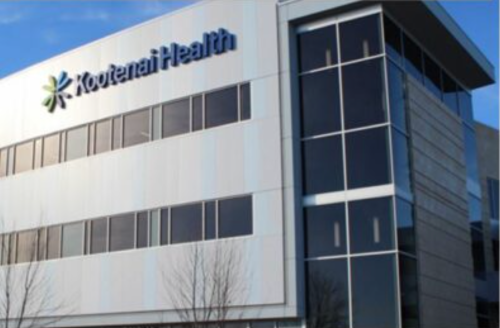 Exterior view of the Kootenai Health building, featuring modern architecture and large windows.