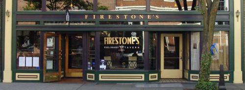 Exterior view of Firestone's restaurant, featuring large windows and a welcoming entrance.