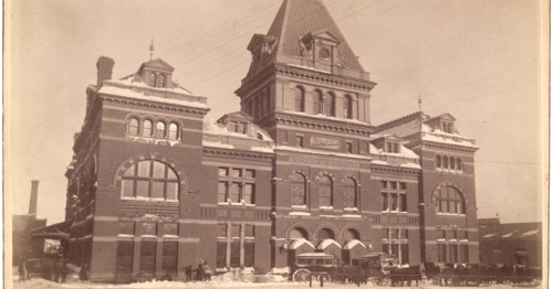 Historic Union Depot building in winter, featuring ornate architecture and snow-covered surroundings.