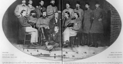 Historical group photo of Union officers in Delaware, May 1864, posed together in military attire.