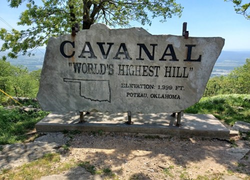 Sign marking Cavanal Hill, "World's Highest Hill," with elevation of 1,999 ft, located in Poteau, Oklahoma.