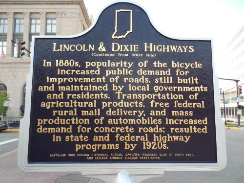 Historical marker detailing the impact of bicycles on road improvements in Indiana during the 1880s.
