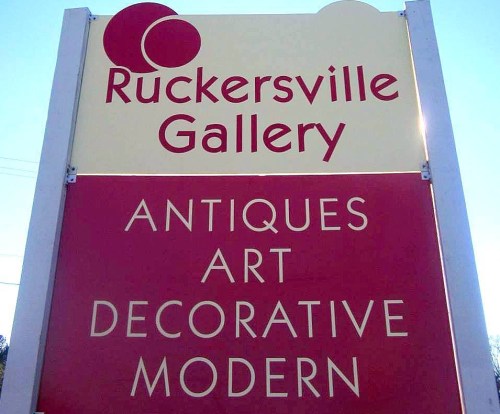 Sign for Ruckersville Gallery featuring "Antiques," "Art," "Decorative," and "Modern" categories.