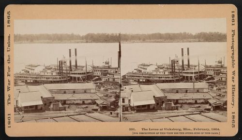 Historic stereoscopic image of steamboats at the levee in Vicksburg, Mississippi, February 1864.