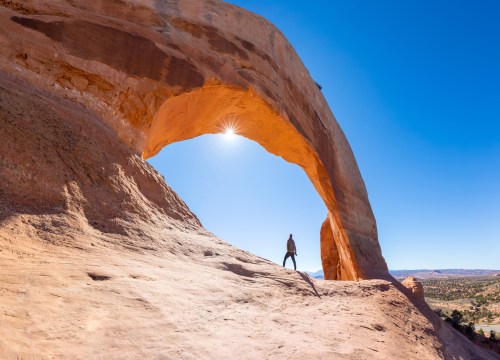 Wilson Arch near Page, Utah, off U.S. Route 191 on a sunny summer day.