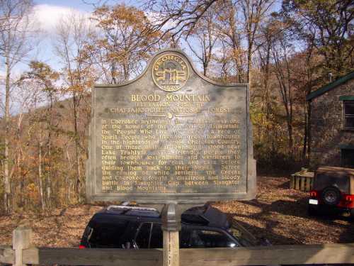 Historical marker about Blood Mountain, detailing its significance to the Cherokee people and local history.