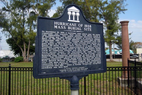Historical marker detailing the Hurricane of 1928 and the mass burial site in Florida.