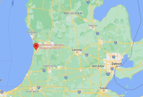 Map showing Michigan with a marker for Downtown Holland Shopping District in the northwest region.