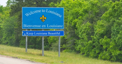 The "Welcome to Louisiana" highway sign.