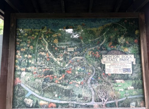 Map of Dighton Rock State Park, featuring trails, landmarks, and colorful foliage in a detailed illustration.