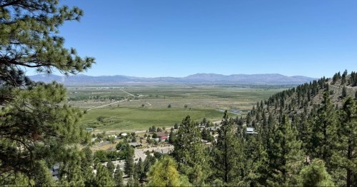 a view of nevada from high up in the mountains of the genoa trail system on a sunny day