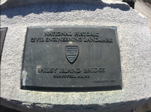 Plaque marking the Bailey Island Bridge as a National Historic Civil Engineering Landmark in Harpswell, Maine.