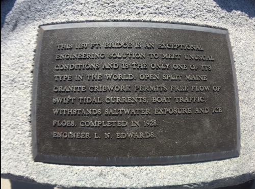 Plaque describing a unique 1928 bridge, highlighting its engineering and resilience to tidal currents and ice flows.