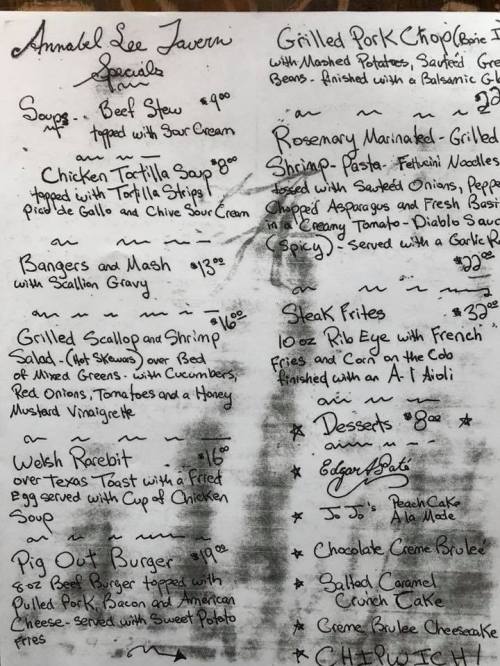 Menu board featuring daily specials at Annabel Lee Tavern, including soups, entrees, and desserts.
