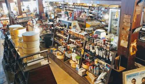 A bustling store interior filled with shelves of various products, including jars, bottles, and boxes.