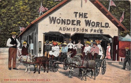 A vintage postcard showing people with goat carts outside "The Wonder World" attraction in Rocky Point, R.I.