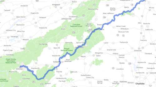 Map showing a blue route through the Appalachian region, highlighting national forests and parks in North Carolina.