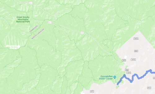 Map showing the Great Smoky Mountains National Park, highlighting roads and the Oconaluftee Visitor Center in North Carolina.