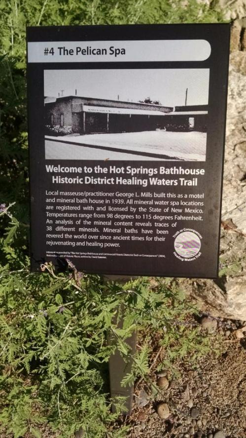 Sign for the Pelican Spa, detailing its history and mineral baths on the Healing Waters Trail in New Mexico.