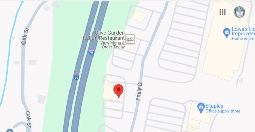 Map showing a location near Olive Garden and Staples, with a red marker on Emily Drive, adjacent to I-79.