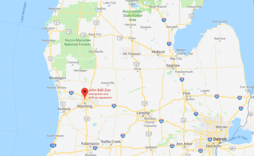 Map showing Michigan with a marker for John Ball Zoo, located near Grand Rapids.